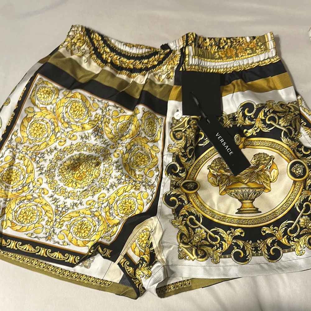 Versace women’s Gold and Black Patterned Shorts